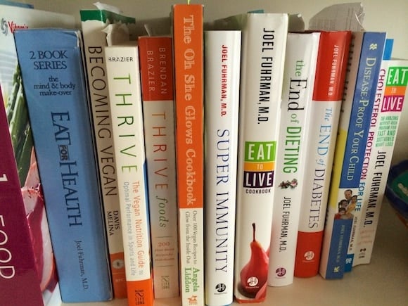 cookbook shelf with healthy cookbooks.