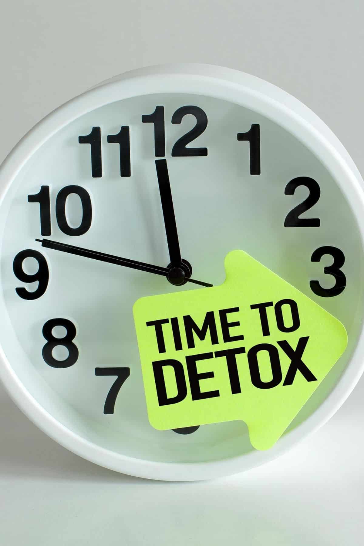 clock with a note that says time to detox on it.
