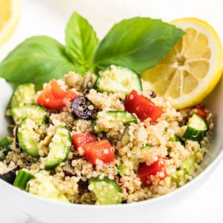 A bowl of quinoa salad with vegetables