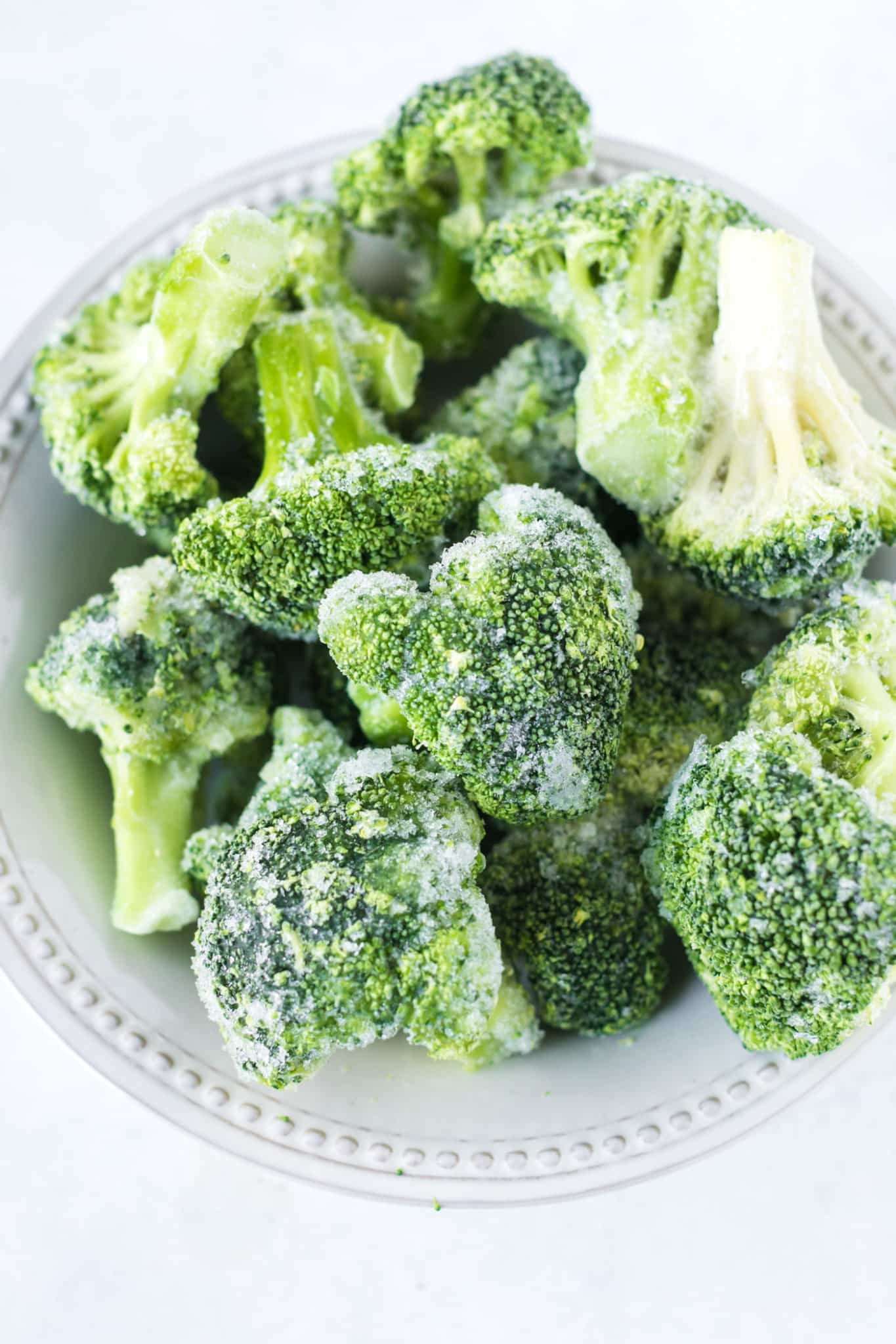 bowl of frozen broccoli florets.