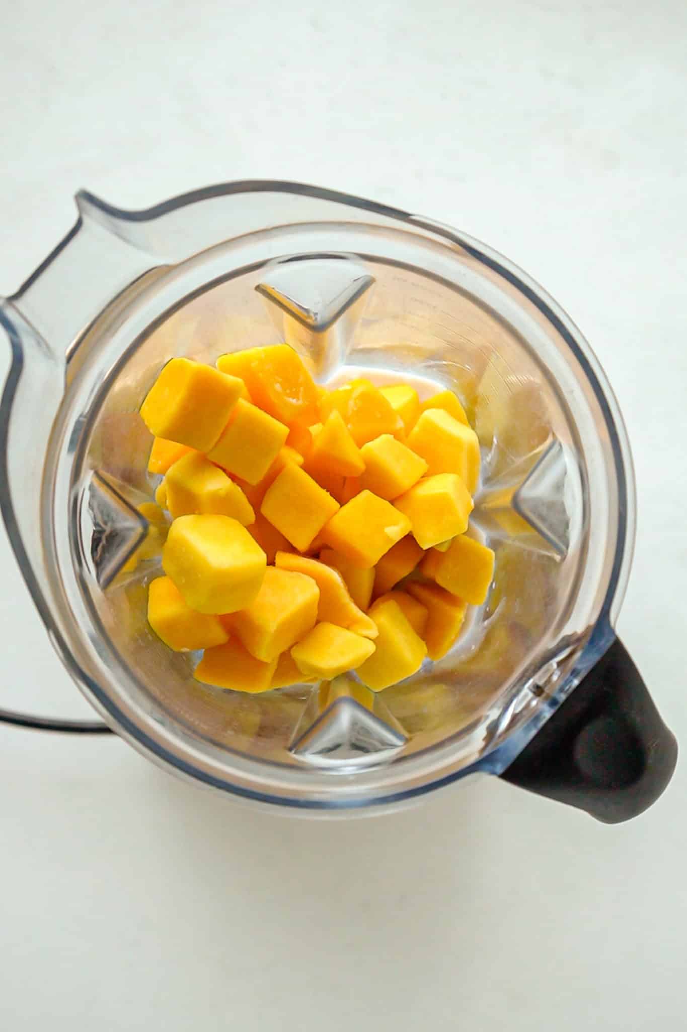 frozen mango in a vitamix