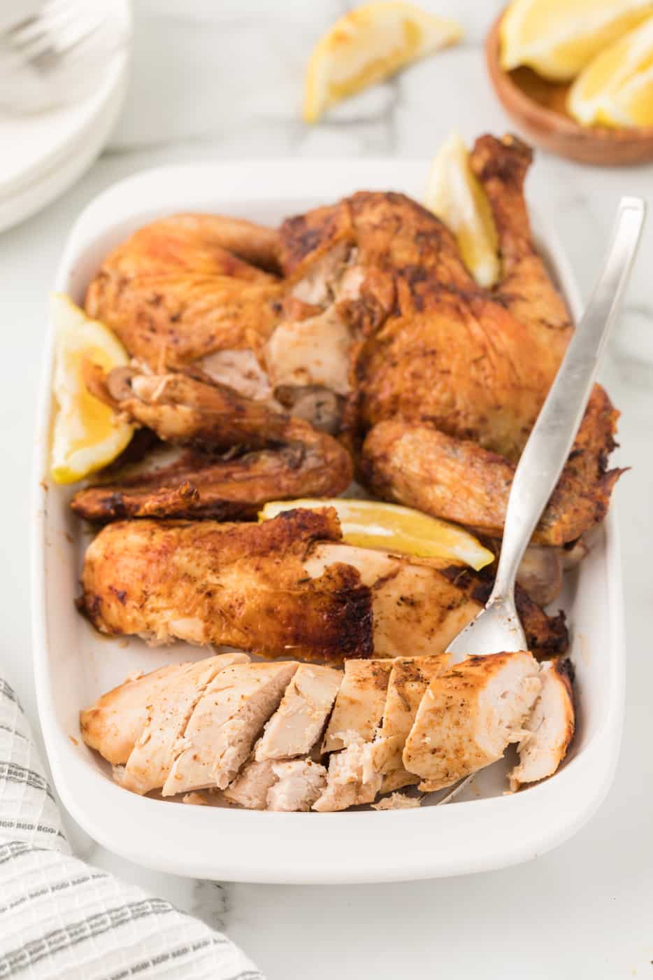 roasted air fryer whole chicken on serving platter.