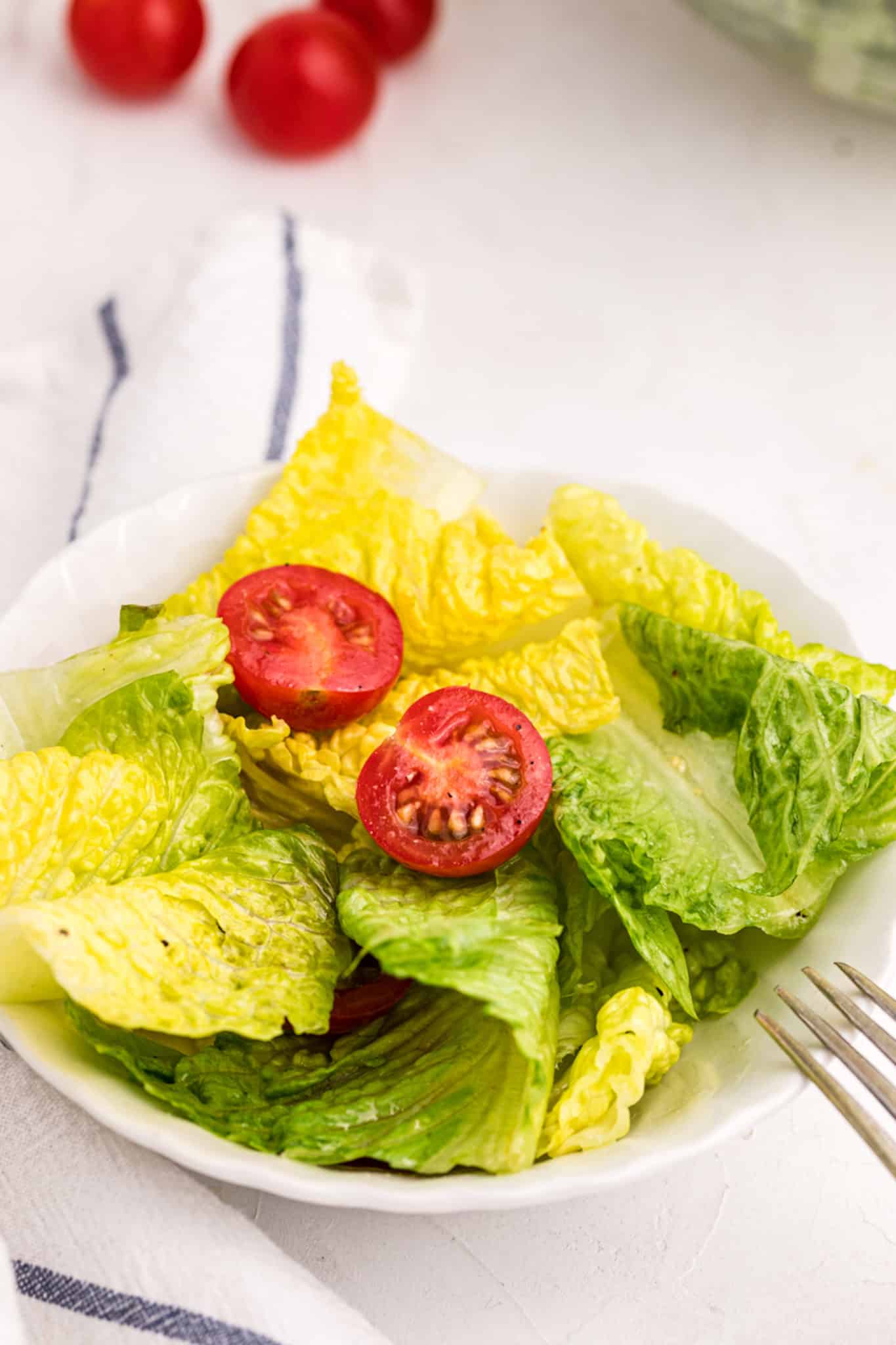 plate with romaine salad.