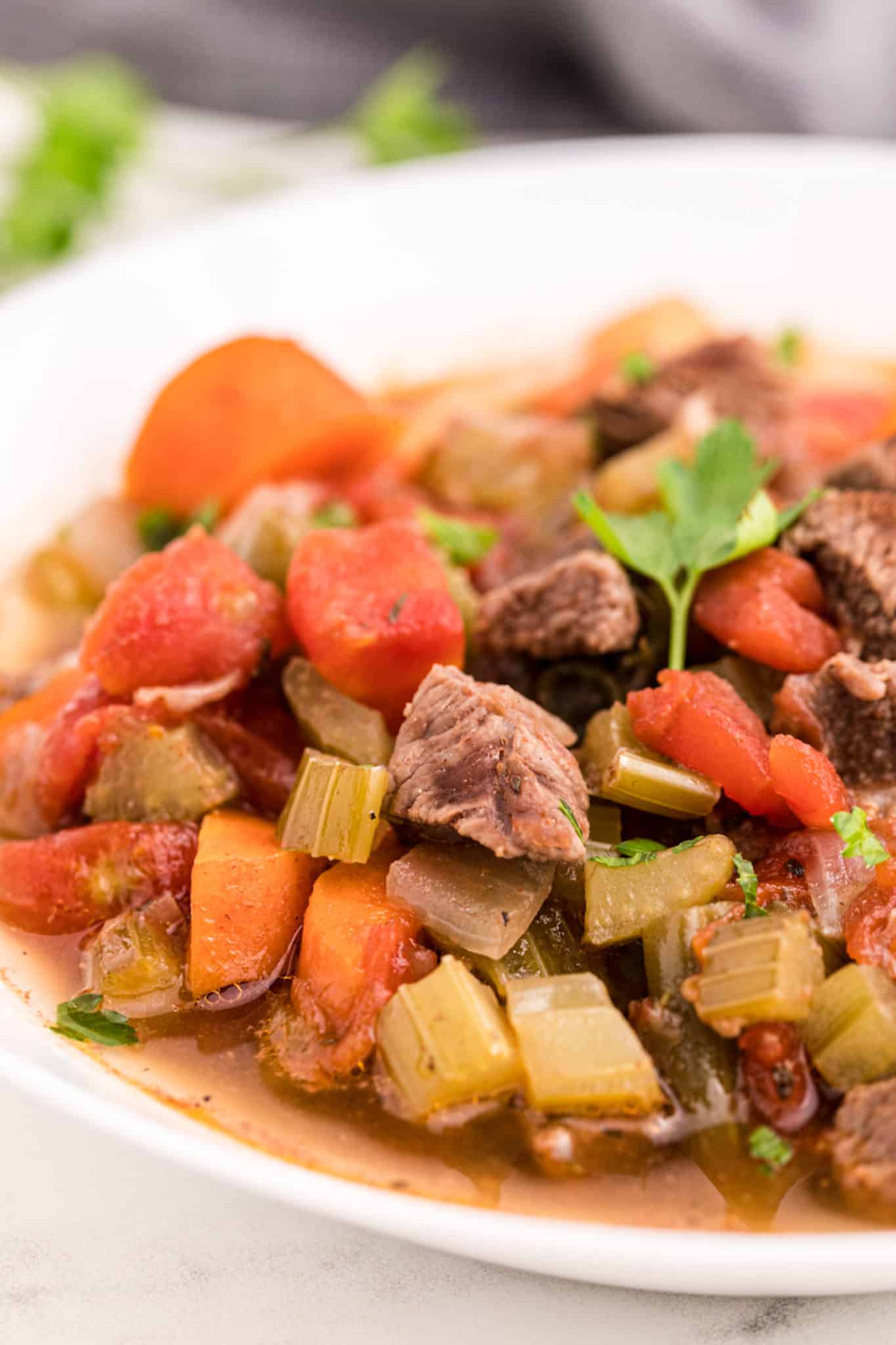 closeup of a bowl of instant pot beef vegetable soup.