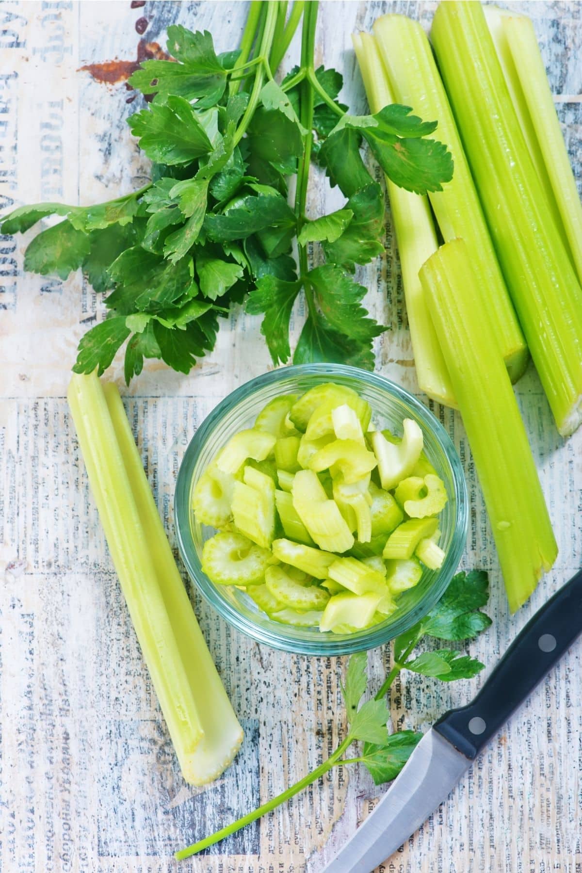 bowl of chopped celery on table.