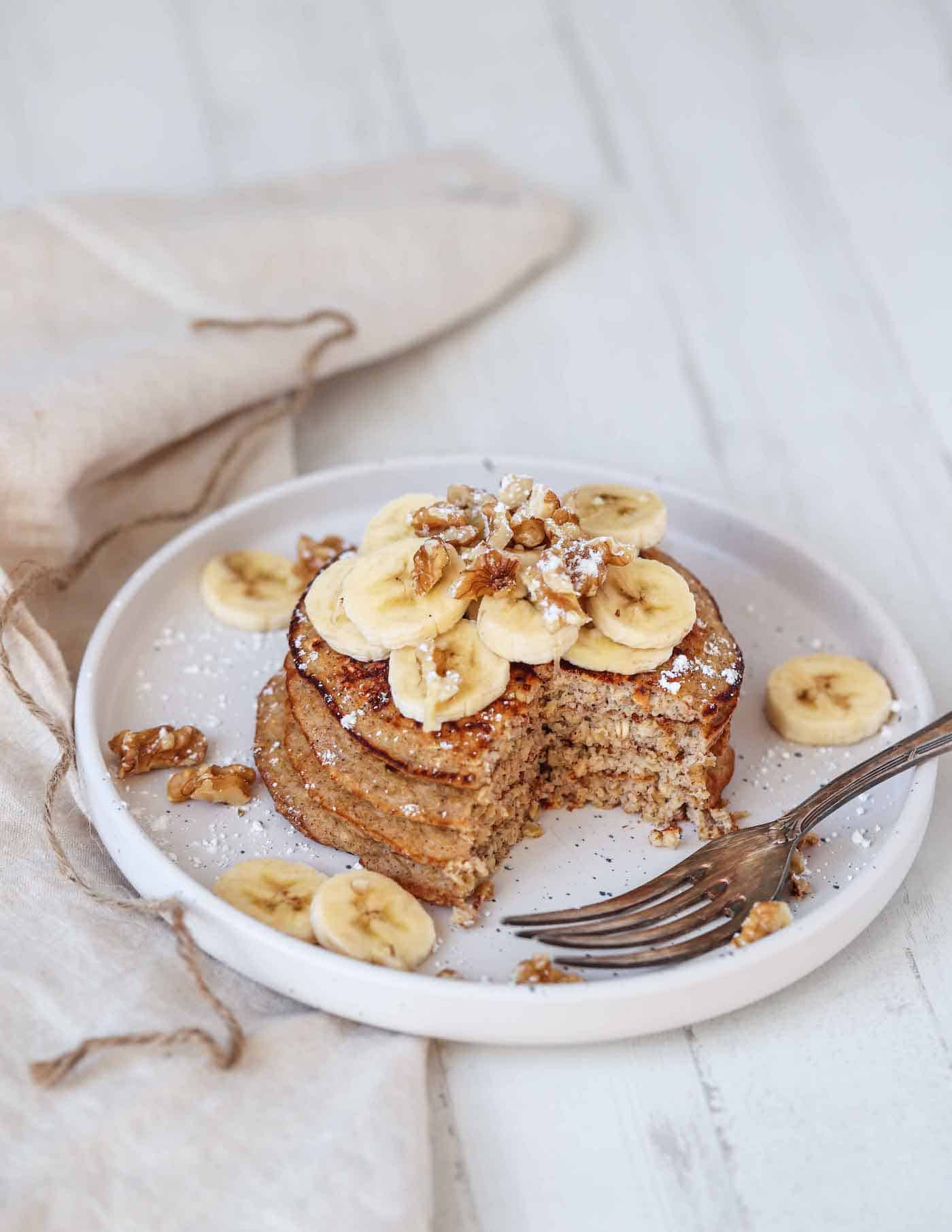 protein pancakes topped with banana slices