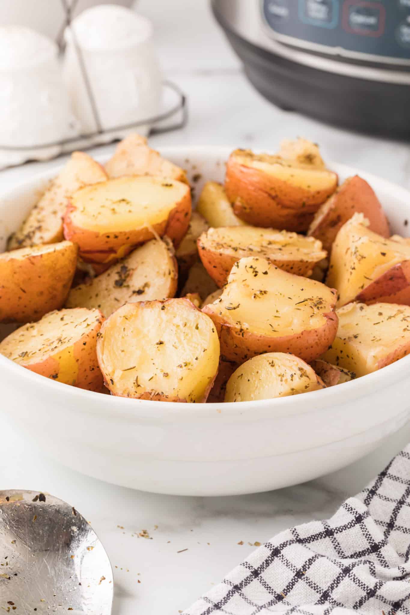 cooked instant pot red potatoes in a bowl.