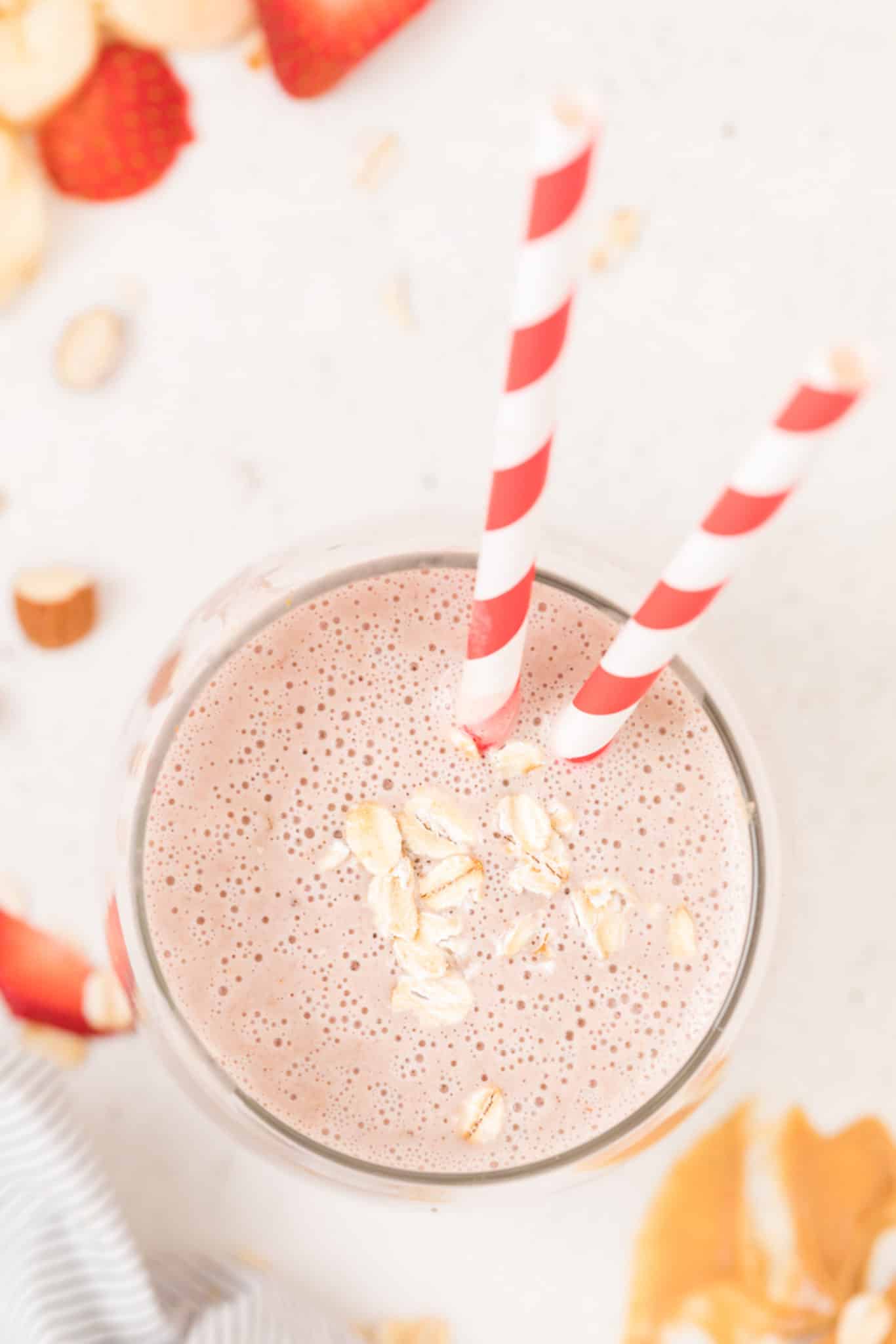pink smoothie with oats on top