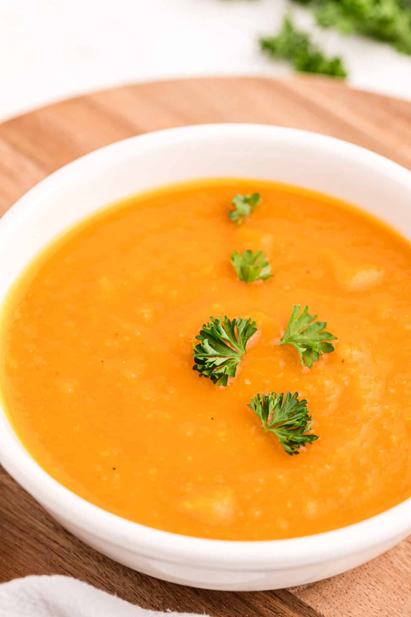 bowl of creamy orange colored soup.