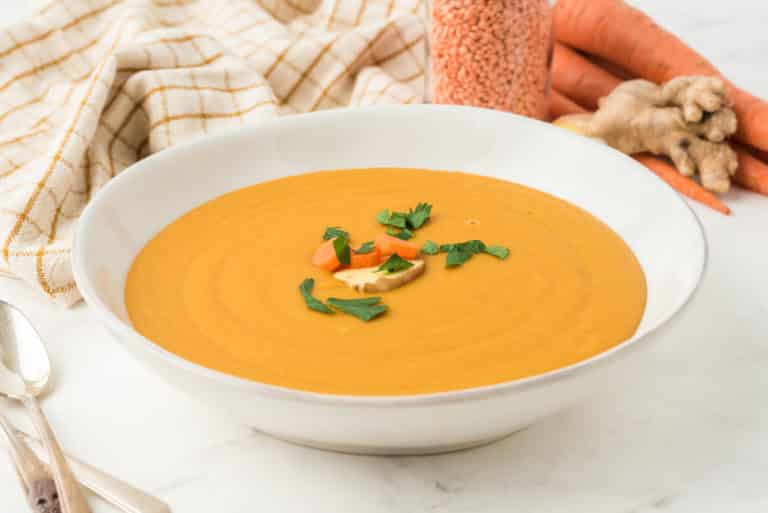 a bowl of carrot ginger soup