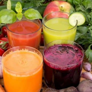 colorful veggie juices on a table