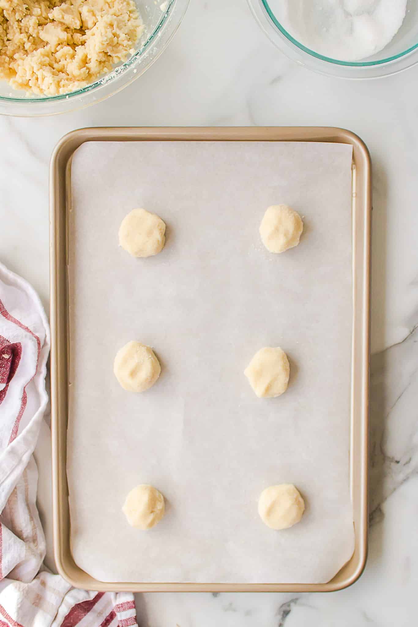 unbaked sugar cookies on baking sheet