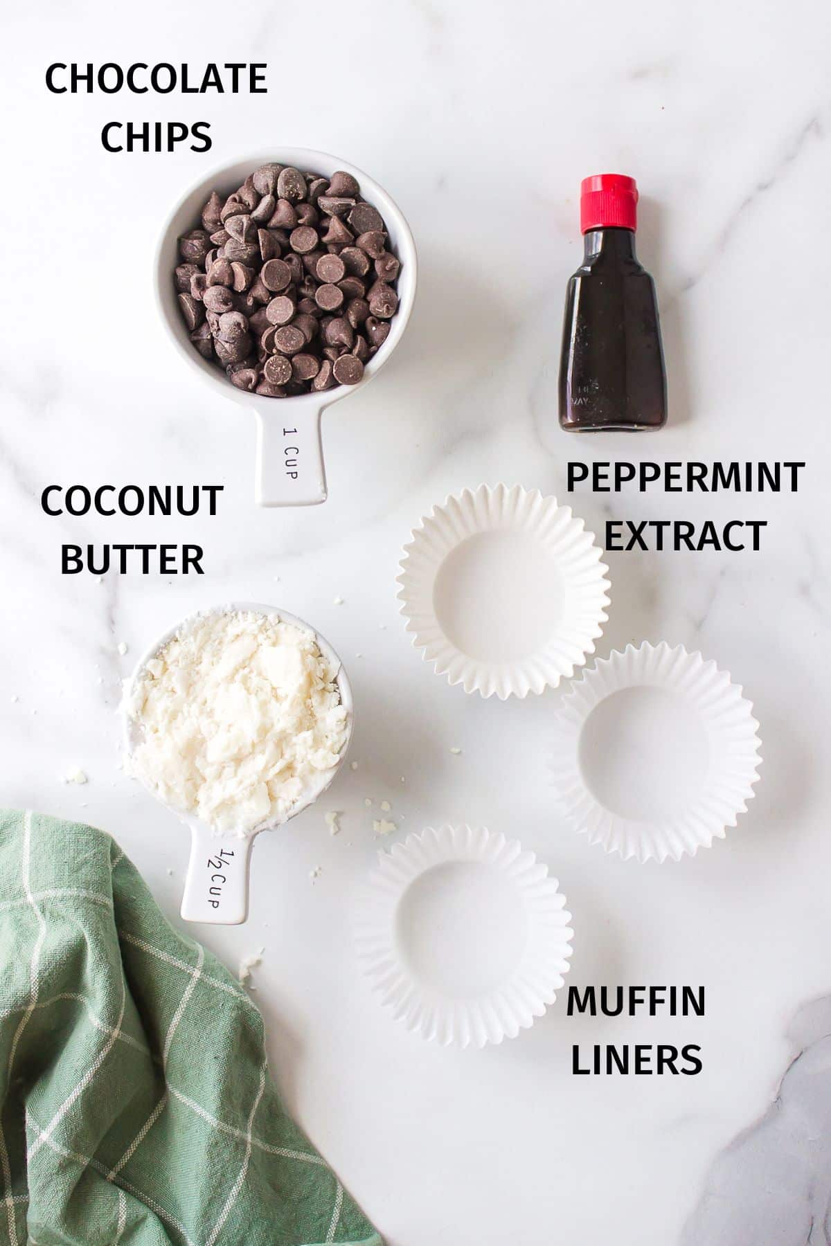 Ingredients for 3 ingredient vegan peppermint patties on a white surface.