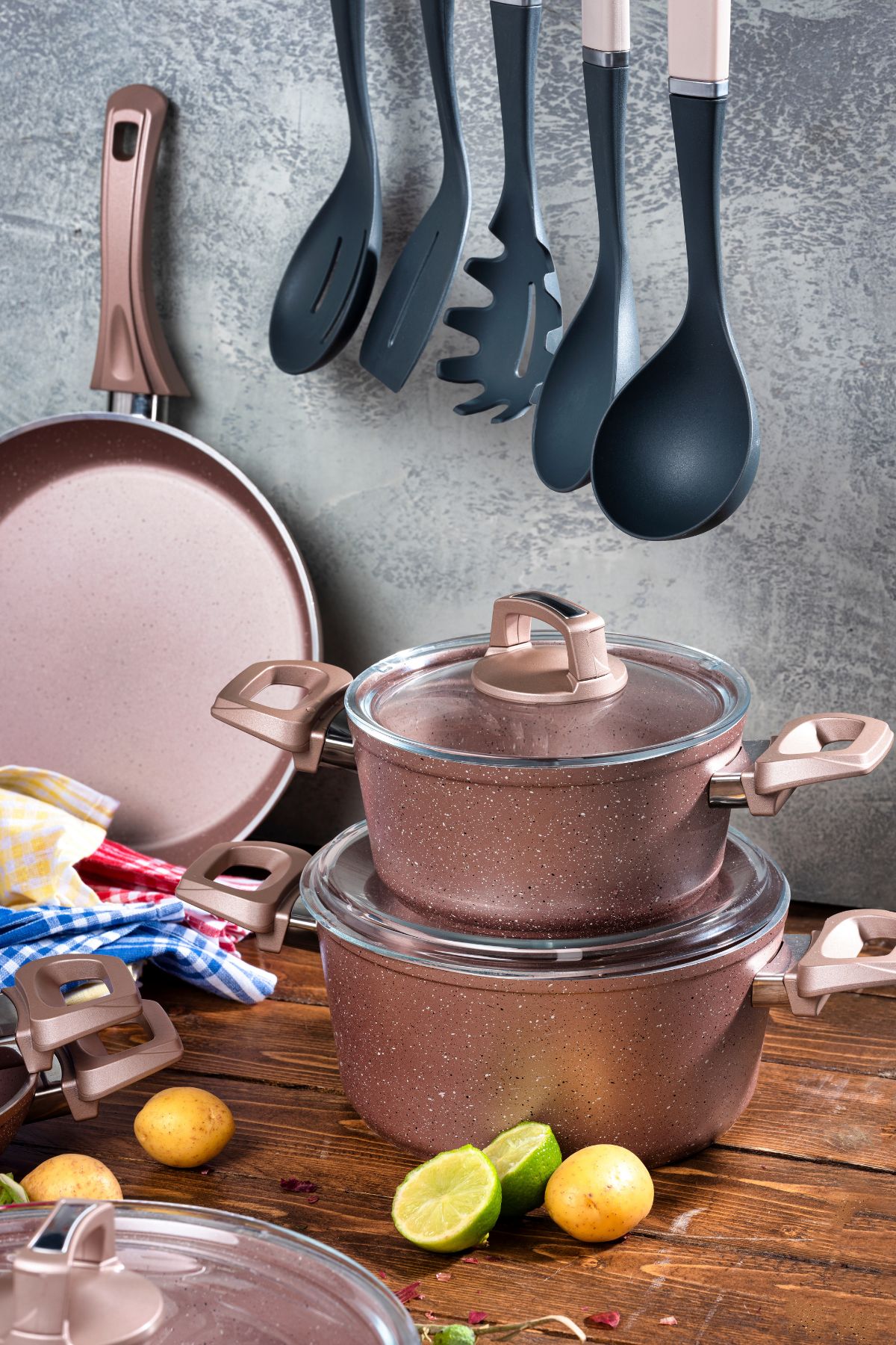 a variety of pots and pans on a counter.