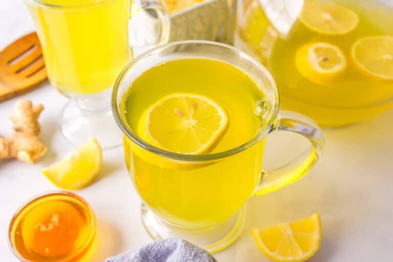 lemon ginger turmeric tea in a mug.